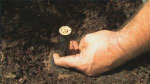 a Redmond Irrigation specialist installs a new pop up head